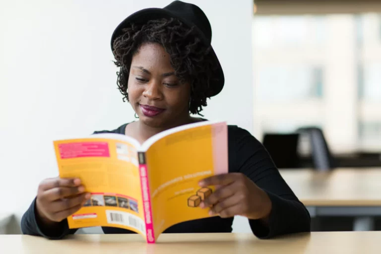 Woman adding to her crystallized intelligence by reading a book