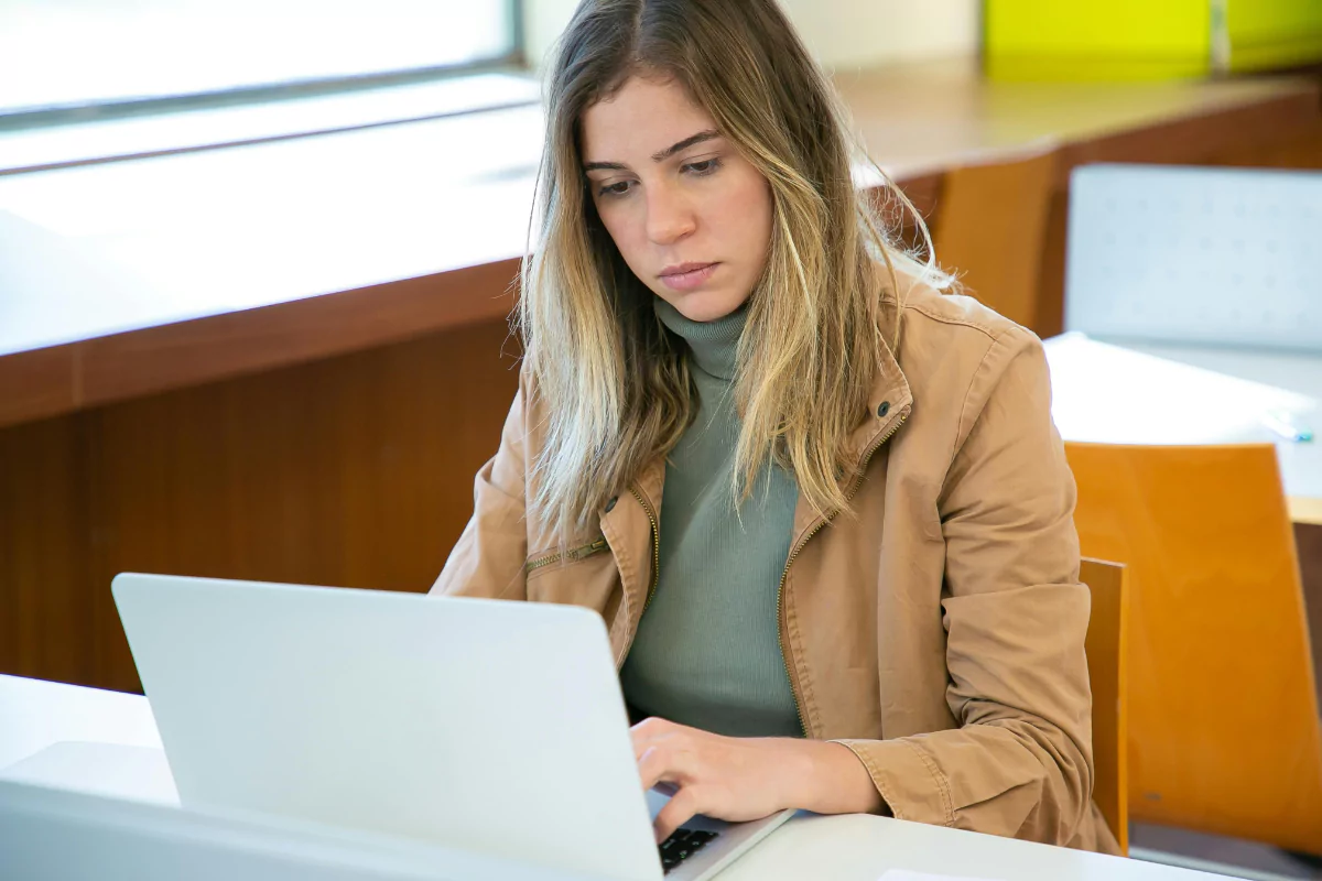 Woman writing a psychology essay